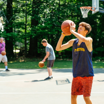 camper playing basketball