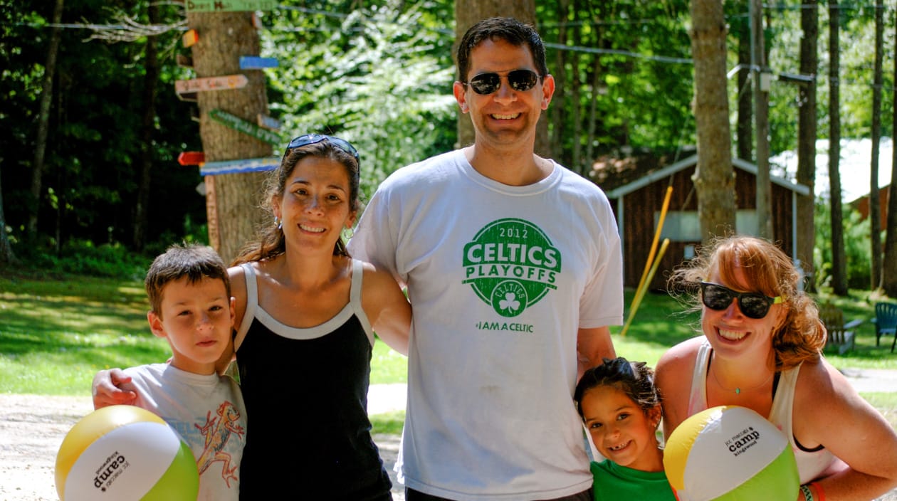 family with volleyballs