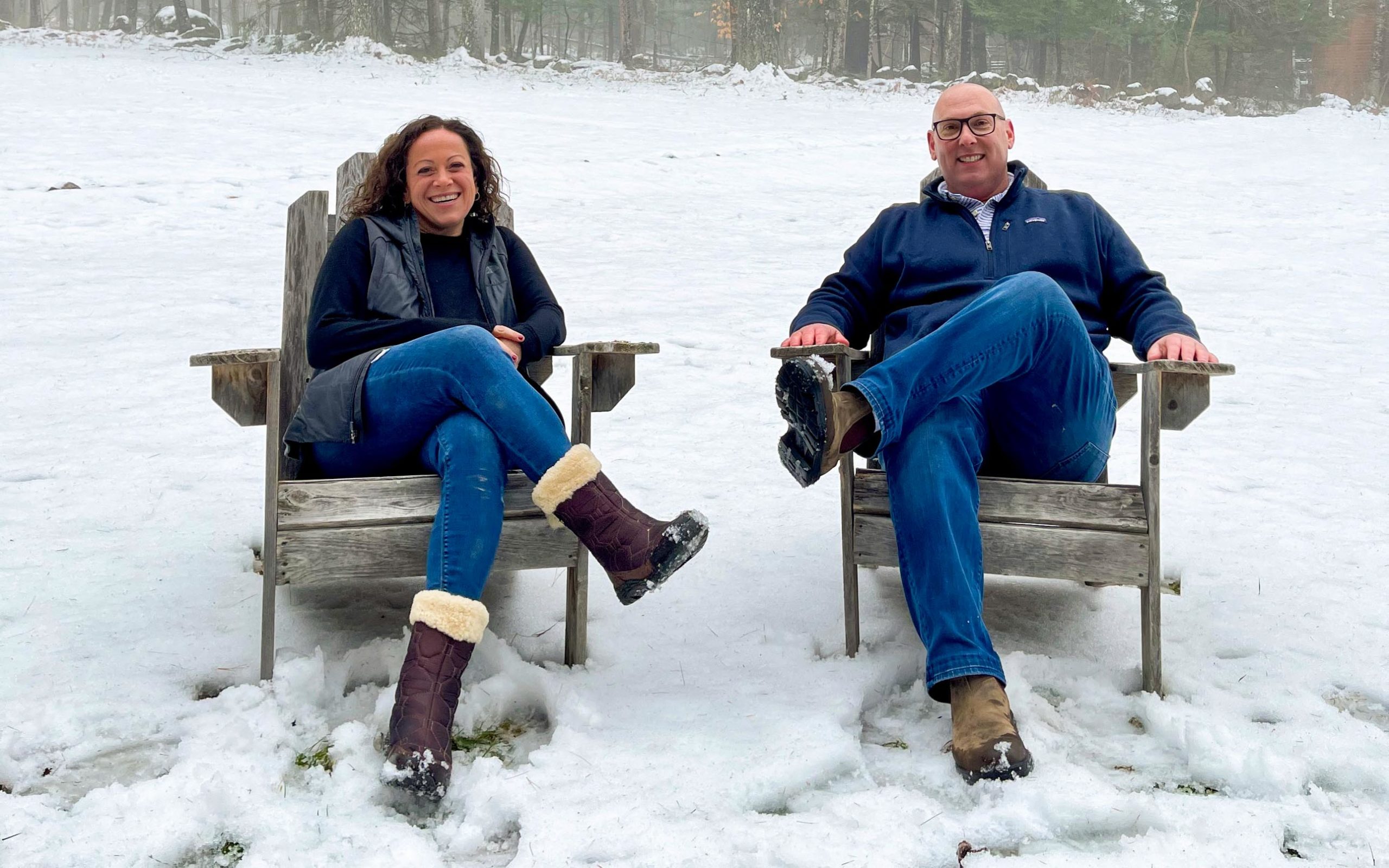 jodi and mitch sitting outside in winter