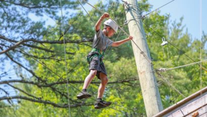 boy on ropes course