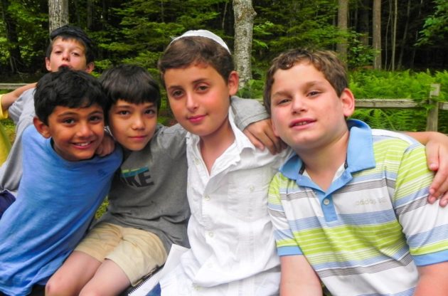 four campers at a jewish event