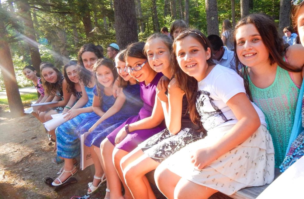 girls at shabbat smiling