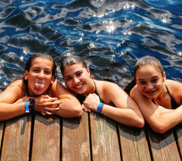 three girls by dock