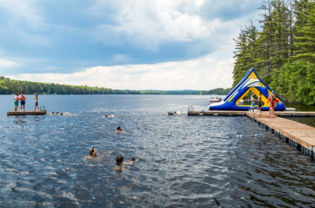 waterfront with slide and dock