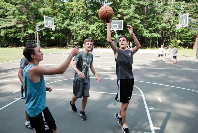 boys playing basketball