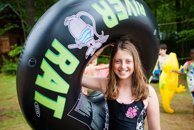 girl holding a water tube