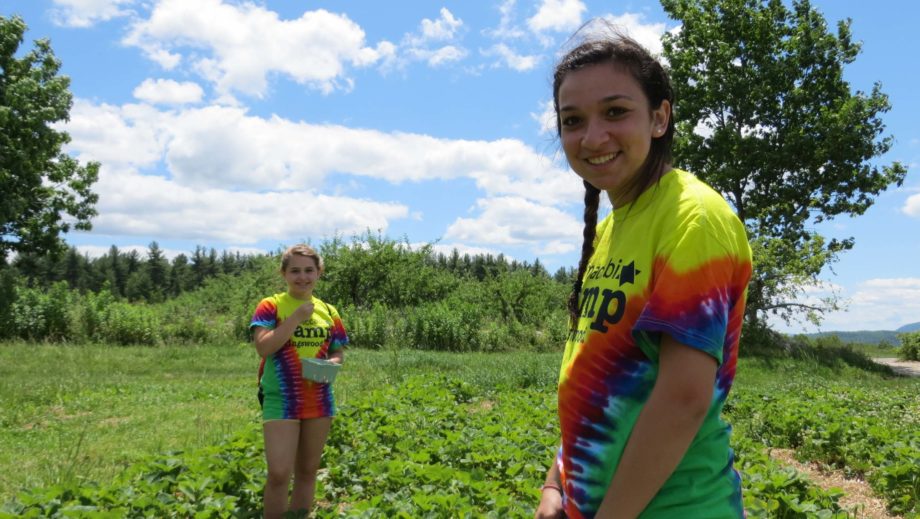 two girls gardening