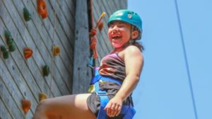 girl on the rock wall