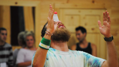 balancing a bottle at a special event