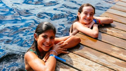 two girls swimming