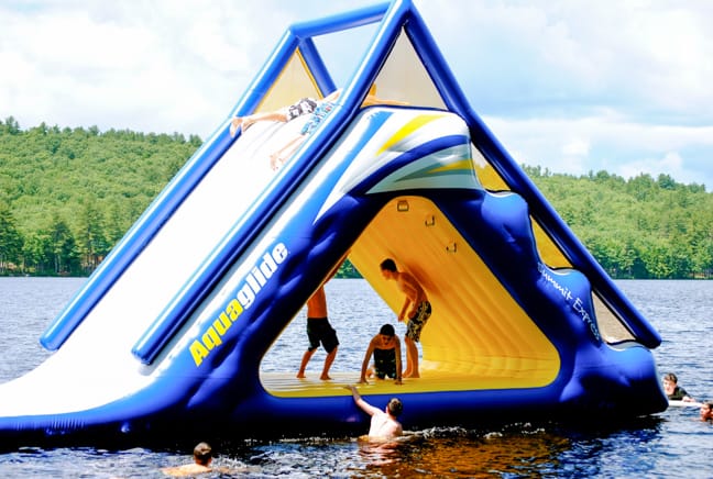boys playing on waterslide